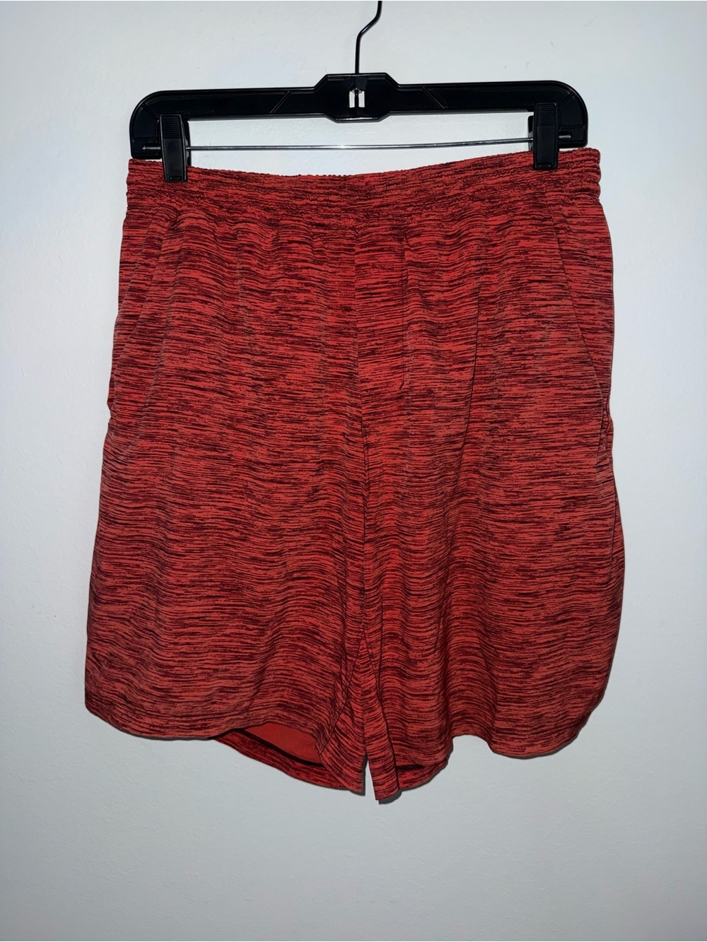 lululemon Men’s Pacebreaker Short. 9 inches. Linerless. Size large burnt orange